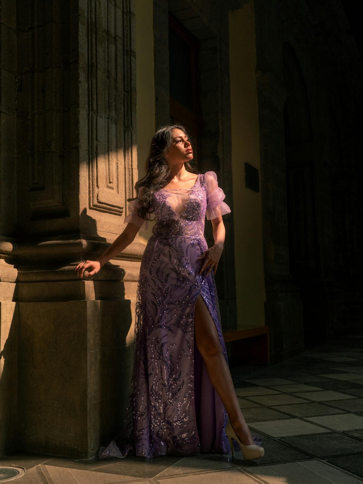 Sun-drenched archway, draped fabric.